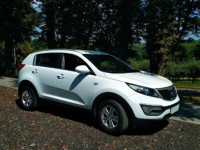 Аренда прокат беленького авто KIA SPORTAGE с отличным водителем Киев