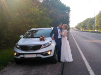 Аренда прокат беленького авто KIA SPORTAGE с отличным водителем Киев
