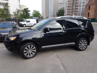 Rent SUV car Mitsubishi Outlander XL 4X4 with an English speaking driver in Kyiv and Ukraine.