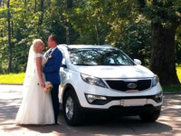 Аренда прокат беленького авто KIA SPORTAGE с отличным водителем Киев